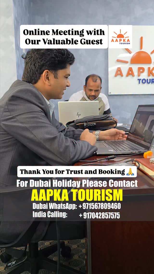 City skyline view with dramatic lighting over mountains.